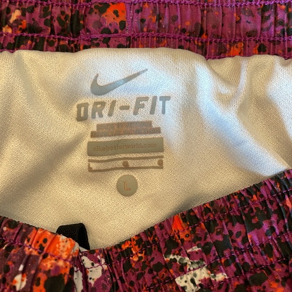 Nike Tempo girls large - purple with splatter of orange, black and white. - Picture 2 of 3